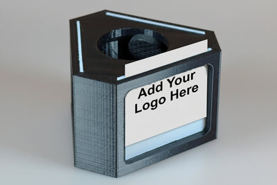 Black rectangular product with a white label on an white background